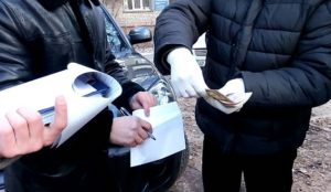 Как в Запорожье задерживали полицейского-взяточника - ФОТО, ВИДЕО