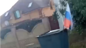 Мелітопольці викинули на смітник прапор росії, - ВІДЕО